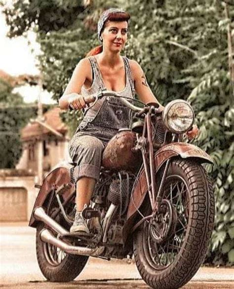 A Woman Riding On The Back Of A Motorcycle