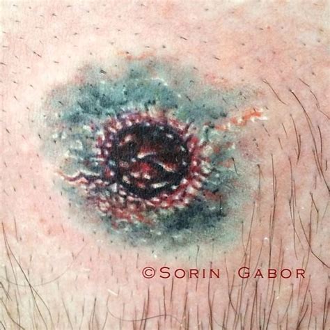 Realistic Color Bullet Hole Tattoo On Chest Entry Wound