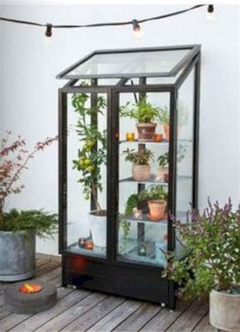 Are you willing to start a diy indoor garden; Small Indoor Greenhouse with Old Windows | Indoor ...