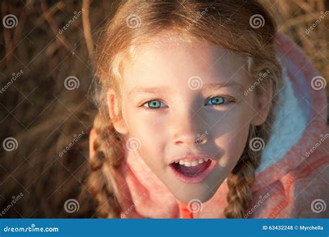 Portrait Of A Girl With Pigtails Closeup Outdoors Stock Photo Image