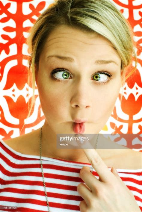 Young Woman Making Silly Face High Res Stock Photo Getty Images