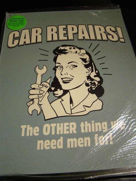 An Old Car Repair Sign With A Woman Holding A Wrench In Her Hand And The Words Car Repairs The