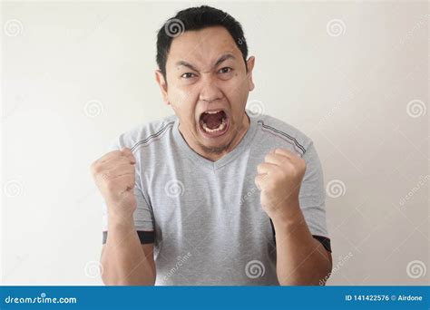 Young Man Shouting Anger Gesture Stock Photo Image Of Insult