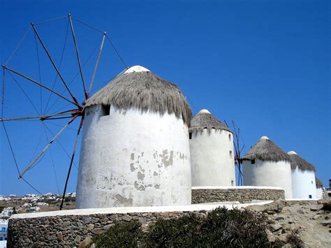 Five Iconic Windmills In Mykonos Greece Encircle Photos