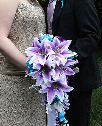 The photo shows the bouquet with purple african violets but these are a limited edition flower, we may have to use an alternative small purple flower, ie maybe hydrangea. Angel Isabella Cascade Wedding Bouquet - Turquoise Purple ...
