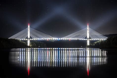 Bucksport Maine Bridge At Night Bridge Lights Reflecting In River And Sky