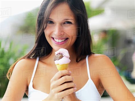 Woman Eating Ice Cream Cone Stock Photo Dissolve