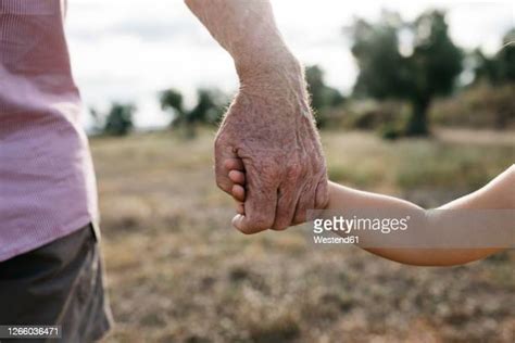 Grandpa Hands Photos And Premium High Res Pictures Getty Images