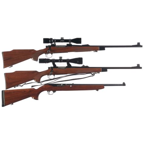 Two Scoped Rifles And One Carbine