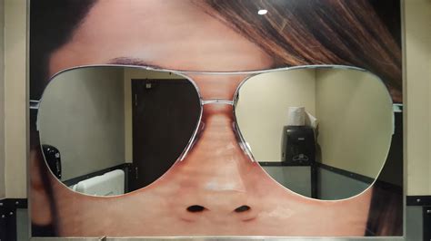 This Bathroom S Mirrors Are Sunglasses Bathroom Mirror Design Sunglasses Mirror Designs