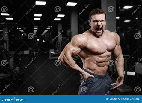 Brutal Strong Bodybuilder Athletic Men Pumping Up Muscles With D Stock