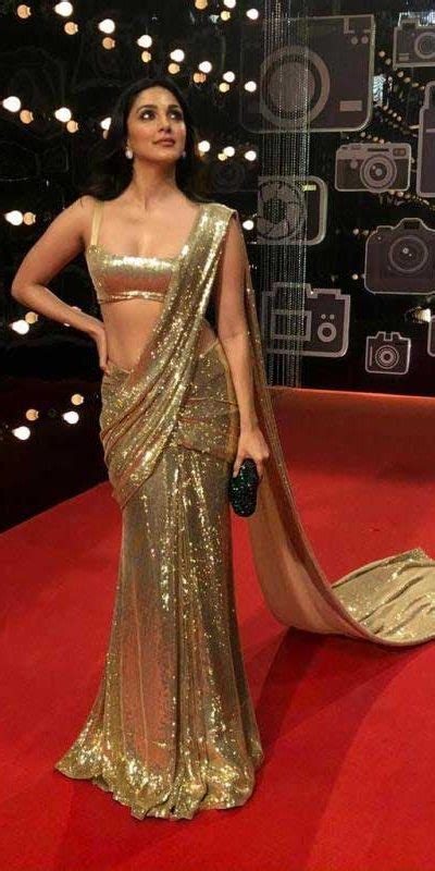 Dazzling Kiara Advani In Heavy Golden Color Sequence Saree