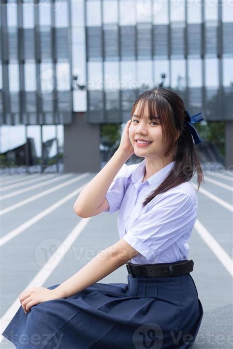 Beautiful Asian High School Student Girl In The School Uniform With