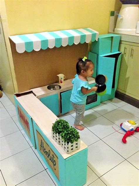 As a playground at home with friends. How To Create A Mini Cardboard Kitchen For Your Toddler ...
