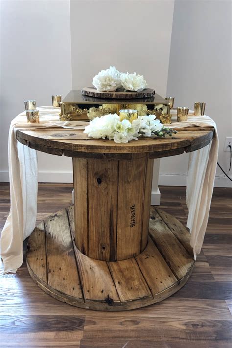 Wooden Spool Set Up As A Cake Table Added A Runner Votives Flowers