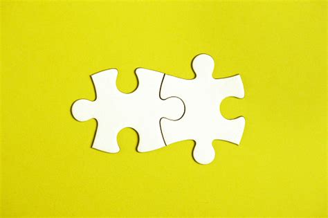 Two Connected Jigsaw Puzzle Pieces Stock Photo Download Image Now