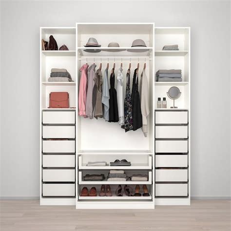 I had an electrician come in and move 2 electrical outlets and wires behind the wall. PAX Wardrobe - white, Tyssedal glass. Shop here - IKEA