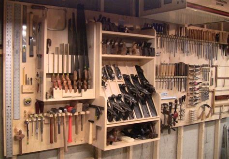 This tool wall, with plane and saw tills, replaces pegboards and random drawers and cabinets scattered all over the shop. Picasa Web Albums - Steve Branam | Woodworking shop ...
