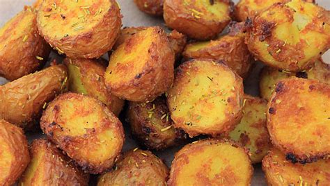 CRISPY TURMERIC ROAST POTATOES Carter Spencer