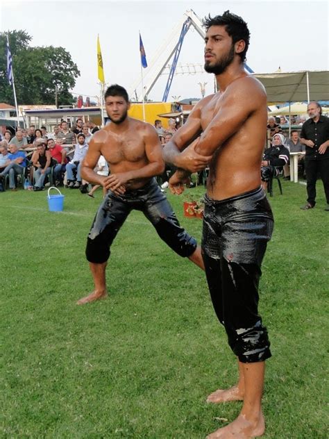 Slick Pics Of Greasy Guys Oil Wrestling