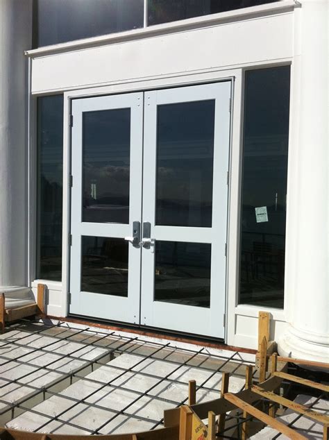 Marvin Commercial Door Installation With Von Duprin Hardware Ot Glass