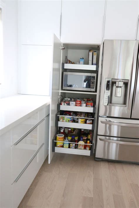 For us, buying a microwave at ikea in the same purchase as our cabinets meant we added about $500 to our purchase price and got an extra $370 a kitchen reno is usually not a cheap undertaking, but we are really happy with the result, and there are some definite perks of an ikea kitchen beyond. An Italian-Style IKEA Kitchen for a Hostess with the Most-est | Kitchen island storage, Ikea ...