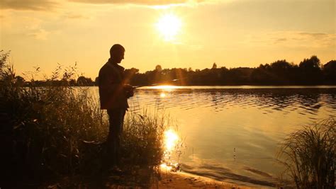 Man Fishing Fisherman Sunset On Stock Footage Video 100 Royalty