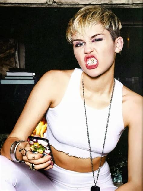 Miley Cyrus Poses In Raunchy Shots For The Bangerz Tour Promo Pictures