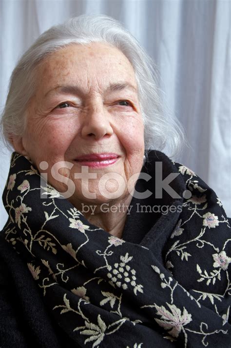 Lovely Grandmother With Cute Granddaughter Smiling Stock Photo