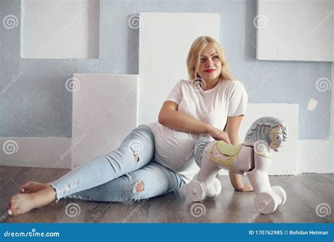 Beautiful Pregnant Woman With Big Belly In A Studio Stock Image Image