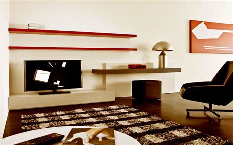 Wooden laminate with white cabinets brown and white. living room lcd unit design - GharExpert