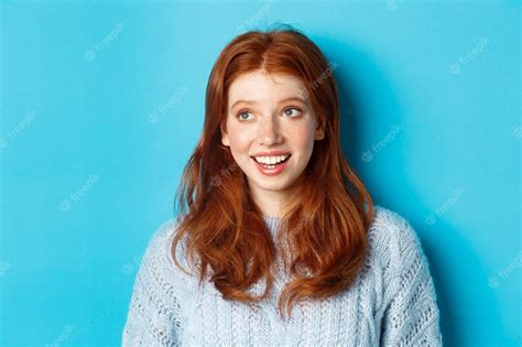 Premium Photo Close Up Of Beautiful Redhead Girl In Sweater Looking