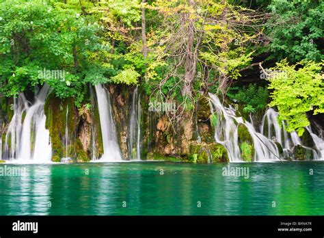 Waterfalls In National Park Falling Into Turquoise Lake Plitvice Lakes