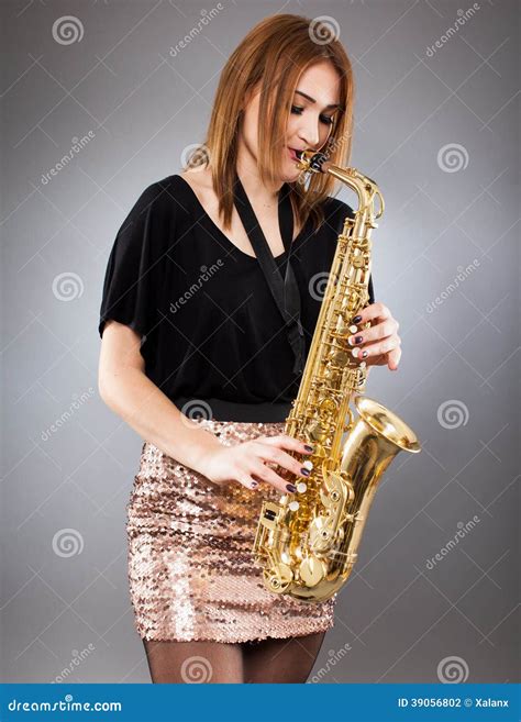 sexy blond female saxophone player musician stock image 8799451