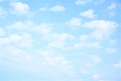 Light Blue Sky With Clouds May Be Used As Background