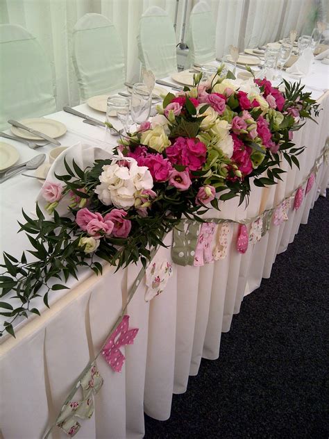 Top table wedding floral arrangement | Wedding table flowers, Wedding