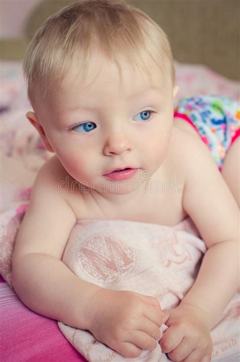 Adorable Baby Lying On The Bed Stock Image Image Of Blond Kids 75370235