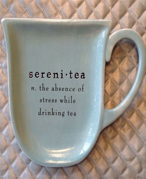 A Tea Cup With The Words Serenitea On It