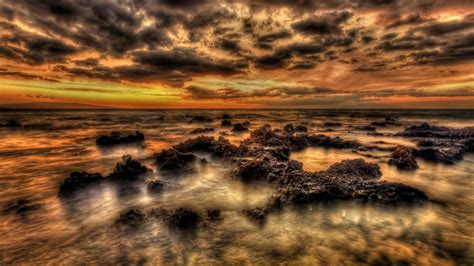 1920x1080 Rocks Shore Sunset Clouds Sea Coolwallpapers Me