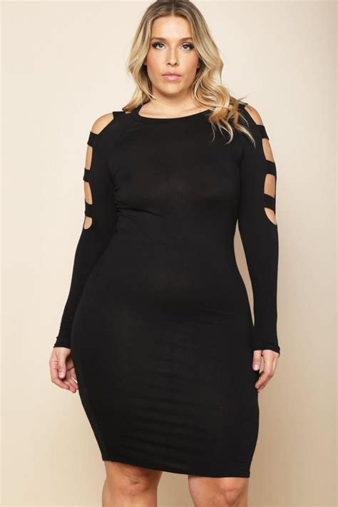 A Plus Size Mini Dress With A Round Neckline Features Long Sleeves