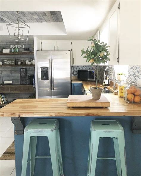The butcher block can obviously handle a whole lot of workload and has been a staple in kitchens across the world for centuries. This sunny kitchen combines our Nantucket Gray Wall Boards ...