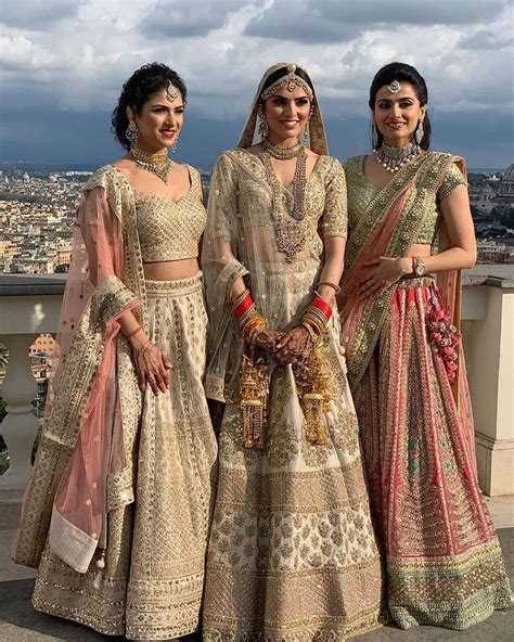 Indian Bride And Brides Babes In Ivory Gold Sabyasachi Wedding Lehenga Frugal Fab Sabyasachi