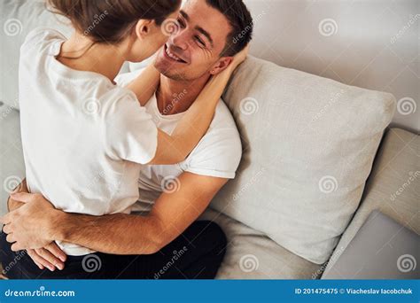 Romantic Young Couple Sitting On The Sofa Stock Image Image Of Living