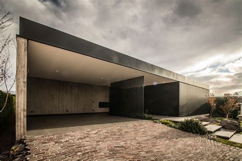Dark And Dashing Exterior In Black Contemporary Ll House In Argentina