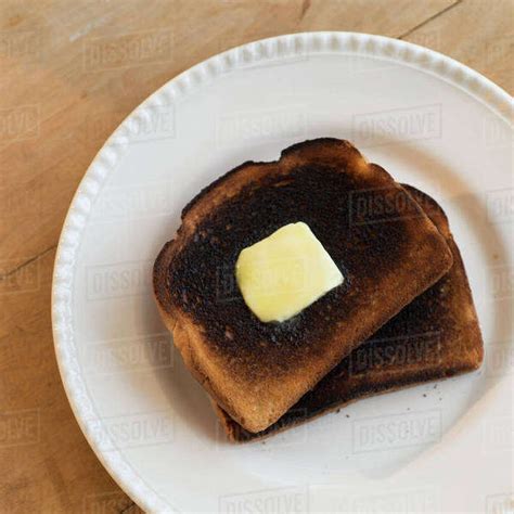 Burnt Toasts On Plate Stock Photo Dissolve