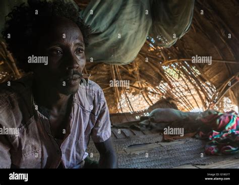 Afar Tribe Man Inside His Hut Afar Region Afambo Ethiopia Stock