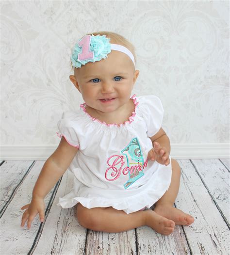 The best first birthday outfits for boys and girls take full advantage of the latest trends—for instagram, yes, but also for you to reminisce about down the road! Baby Girl First Birthday Dress Pink & Teal