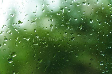 Raindrops On Window Pane With Blurred Background Stock Image Image Of