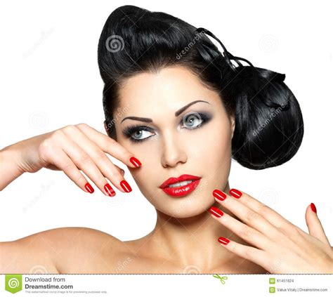 Fashion Woman With Red Lips Nails And Creative Hairstyle