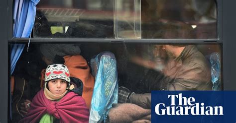 Police Escort Refugees Through Slovenia In Pictures World News The Guardian